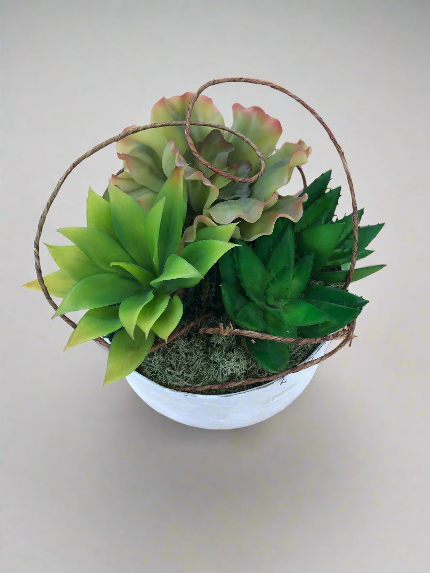 Small artificial arrangement with green succulents