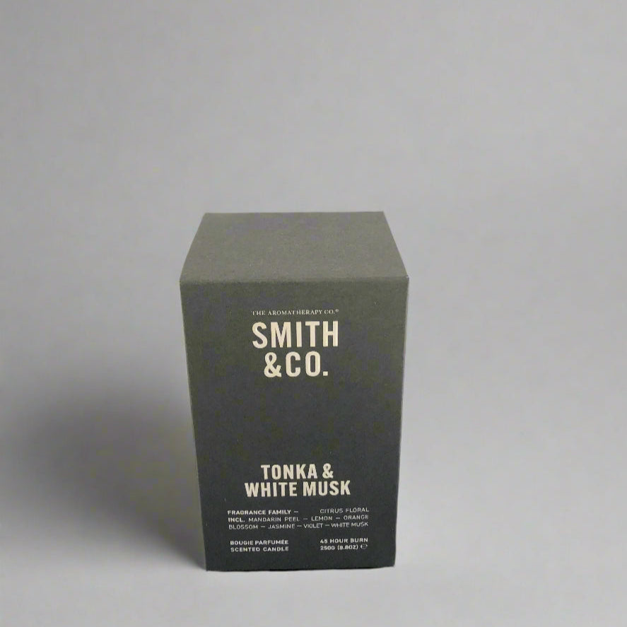 Black box with 'Smith & Co.' branding on a black surface against a white background