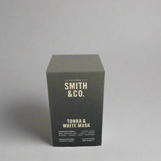 Black box with 'Smith & Co.' branding on a black surface against a white background