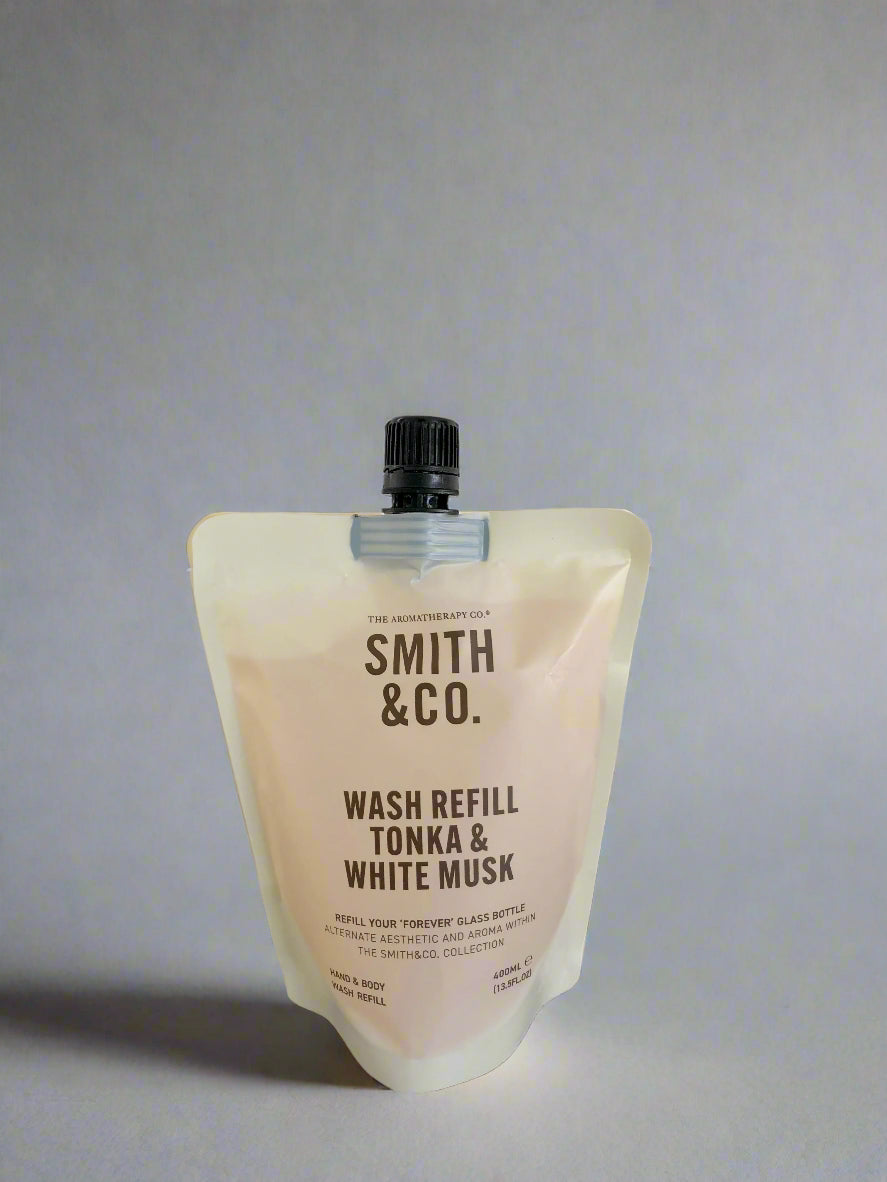 Smith & Co. wash refill pouch on a black surface with a white background