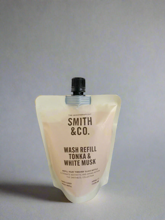 Smith & Co. wash refill pouch on a black surface with a white background