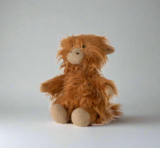 Brown plush toy on a white background