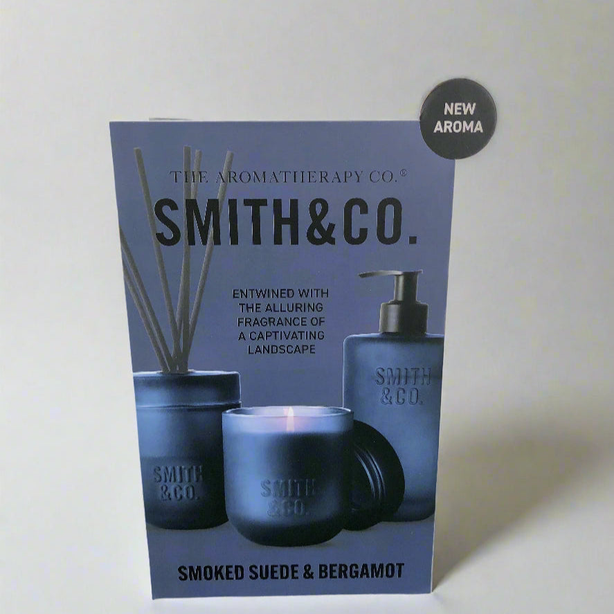 Smith & Co. Aromatherapy product packaging on a dark surface with a light background