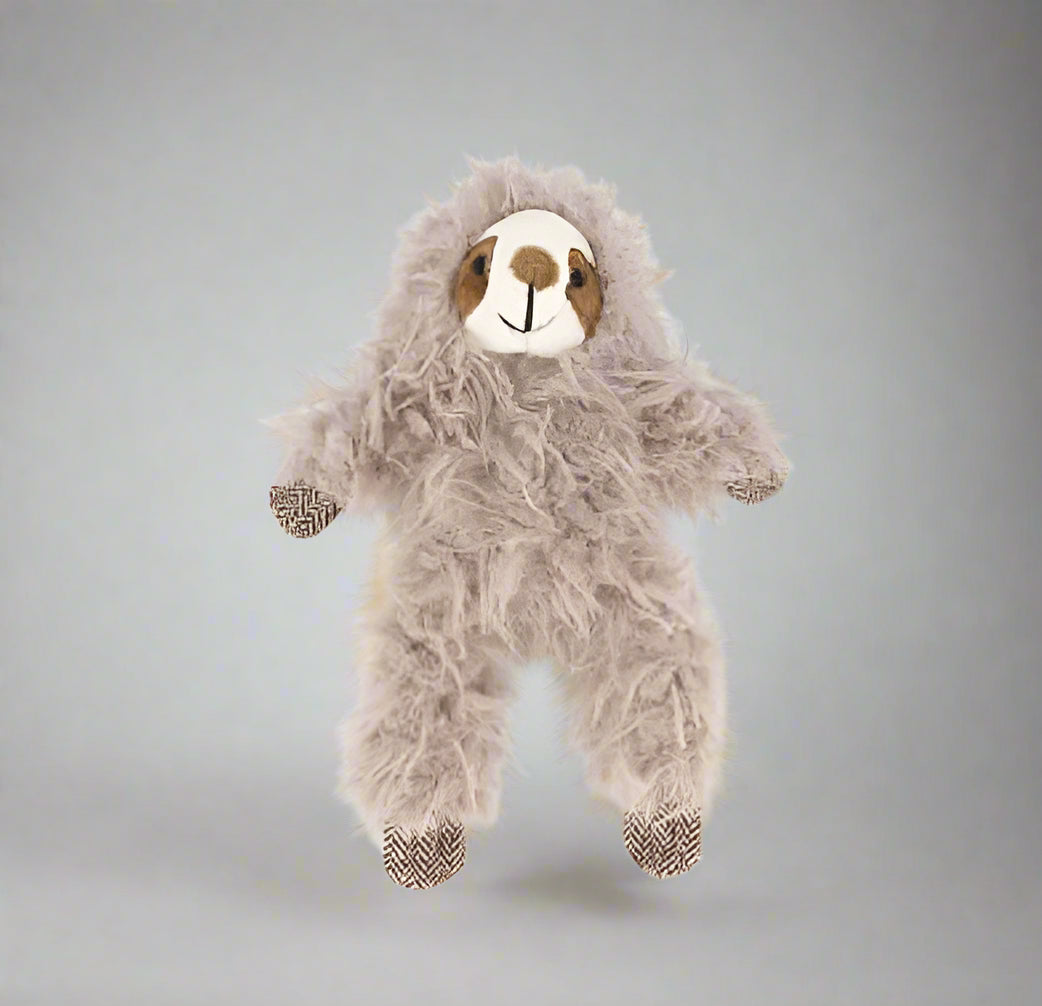 Plush toy sloth on a white background