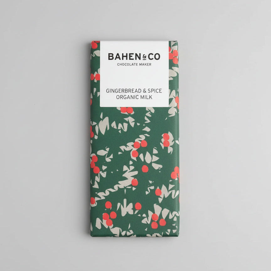 Bahlen & Co gingerbread & spice organic milk chocolate bar on a dark textured surface